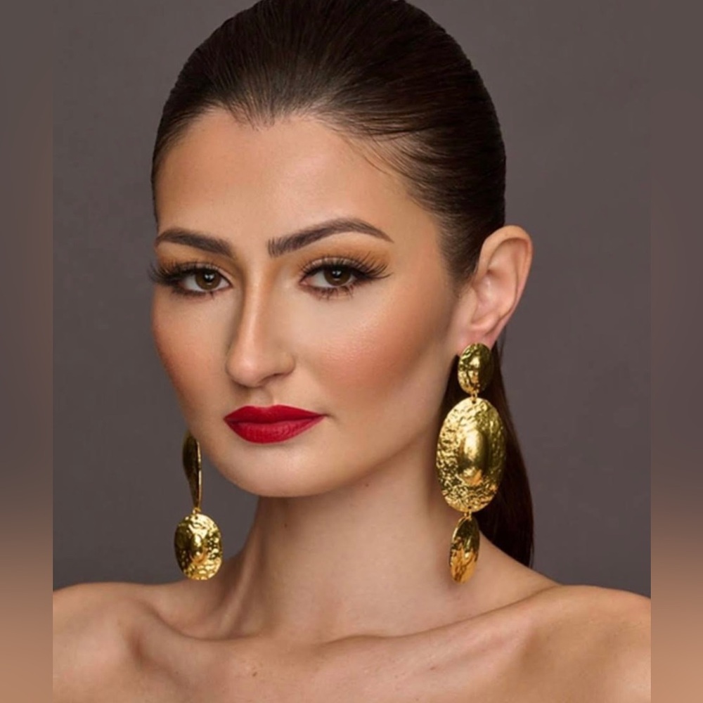 Gold color dangle earrings